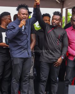 management- Abeiku Santana(left), Bullet(Right)