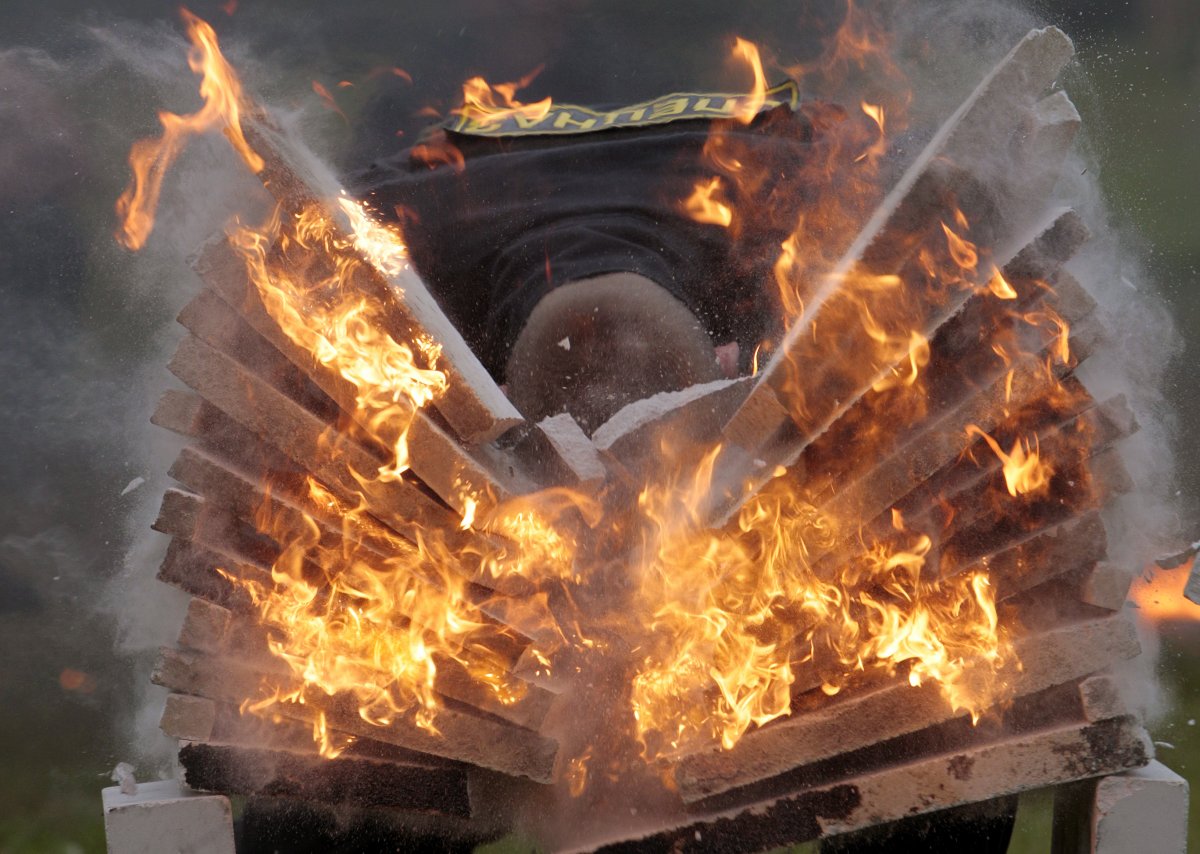 the-red-berets-stage-annual-displays-of-skill-where-some-troops-head-butt-flaming-concrete-blocks