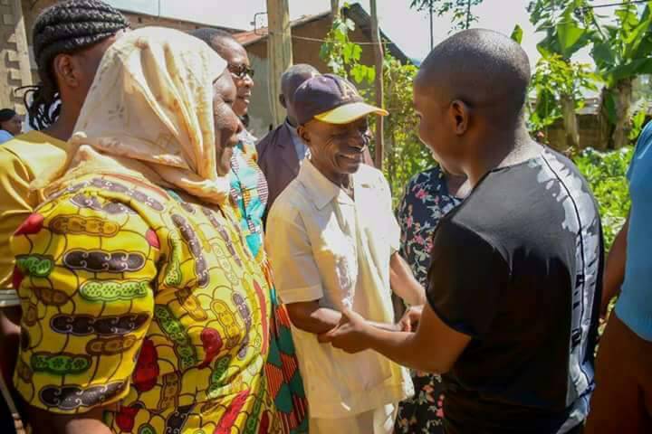 Samuel Abasai in Kakamega with his parents