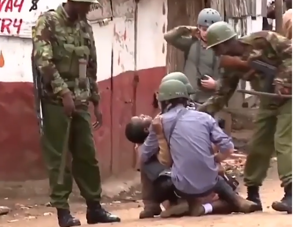 Sad: School children caught up in running battle between the police and opposition supporters (Video)