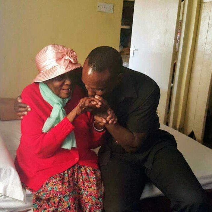 Anthony Gichuru with his great Grandmother