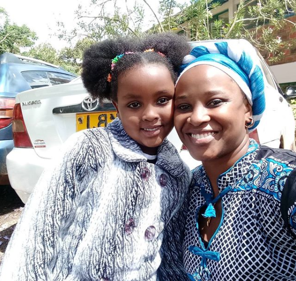 Kanze Dena with her friend's baby girl