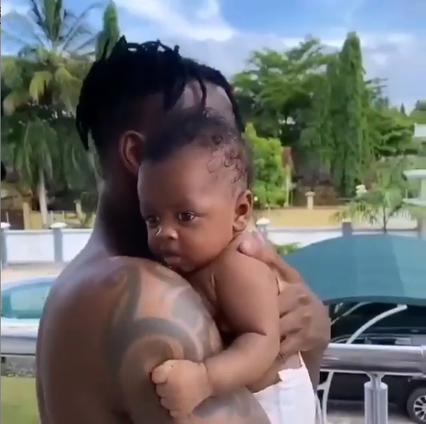 Aww! Watch as Diamond rocks baby Naseeb during daddy-son bonding moments [video]