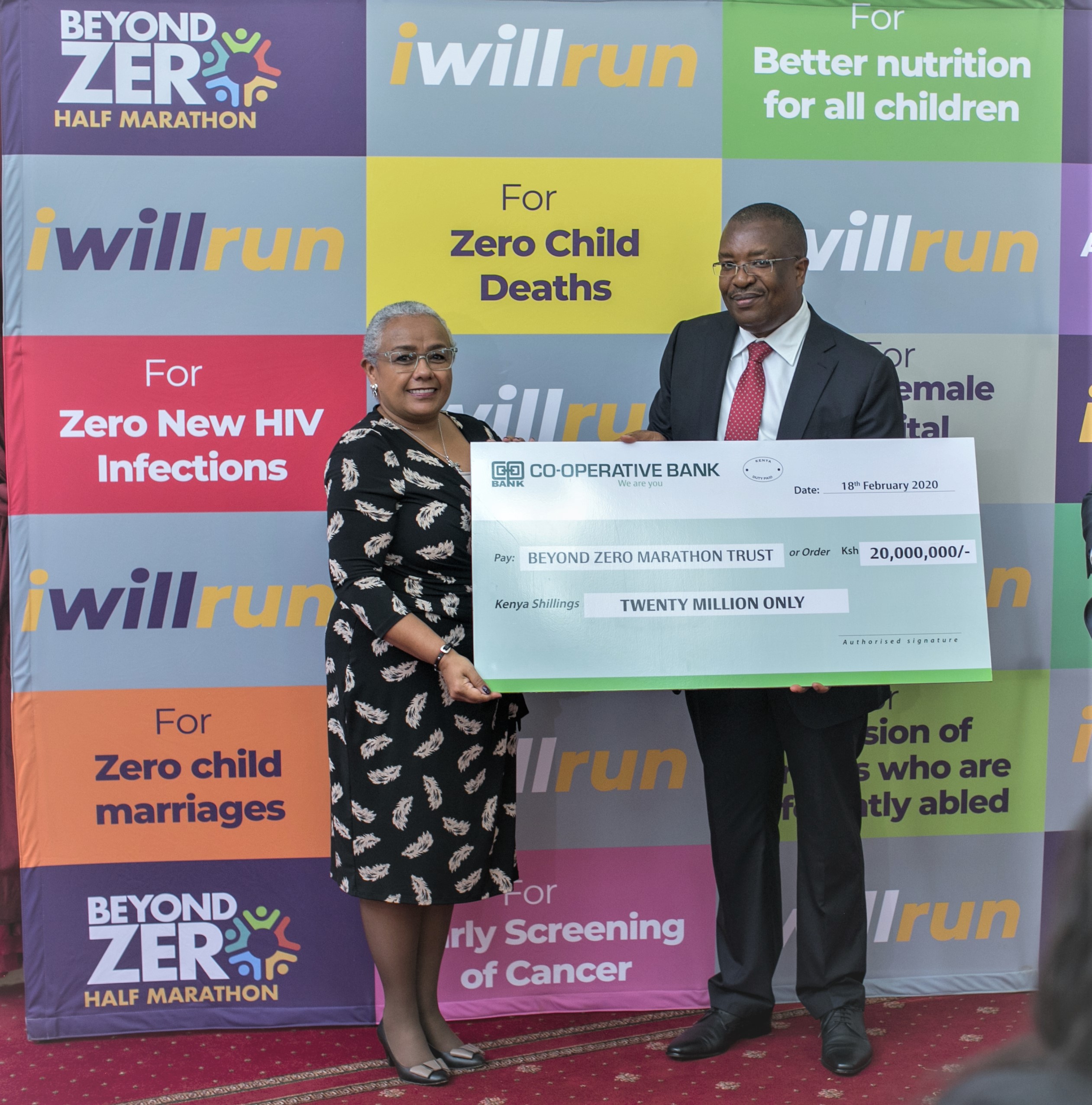 H.E. the First Lady Mrs. Margaret Kenyatta (Left) receives a dummy cheque from the Group Managing Director & CEO Co-operative Bank Dr. Gideon Muriuki (Right) for the Sh20 million donation by the Bank to the First Lady’s Beyond Zero Initiative on 18th February 2020 at State House, Nairobi.