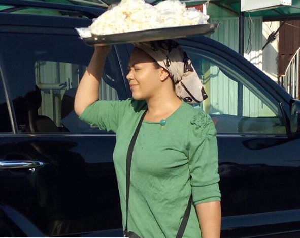 Nadia Buari hawking on the street of Lagos